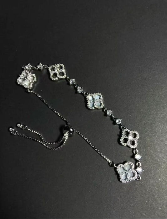 Silver four-leaf clover bracelet